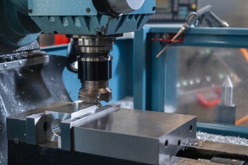 milling cutter for metal, hands of the master measure the detail of calipers