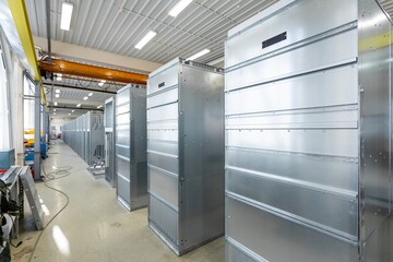 electrical cabinet housings, installation of components in production, assembly shop of metal electrical cabinets