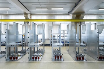 electrical cabinet housings, installation of components in production, assembly shop of metal electrical cabinets