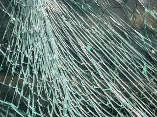 A broken car window that hasn't fallen apart yet, as a background