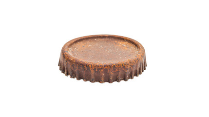 A rusty bottle cap with a textured rim and a flat top shows signs of age and exposure, isolated against a black background.