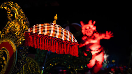 Traditional demon ogoh-ogoh at ritual parade of terrible monsters - Ngrupuk, which is held in evening of Nyepi - Balinese New Year before silence day. Arts and culture of Bali island people.