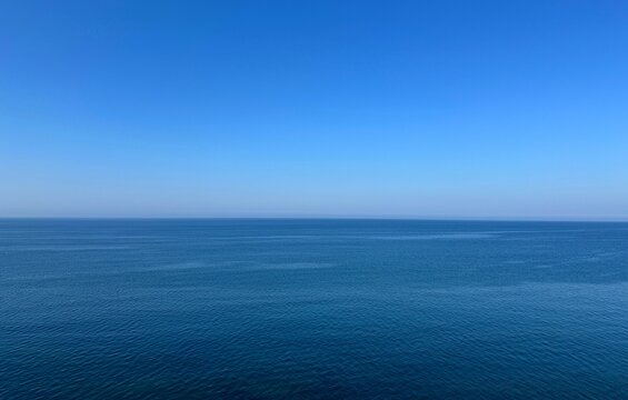 Endless sea and blue sky to the distant horizon.