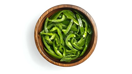 Sliced Green Bell Peppers in Wooden Bowl Isolated on White Background