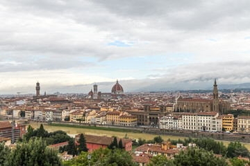 Fototapeta premium A Florence Firenze city in Italy Toscana view with a river running through it
