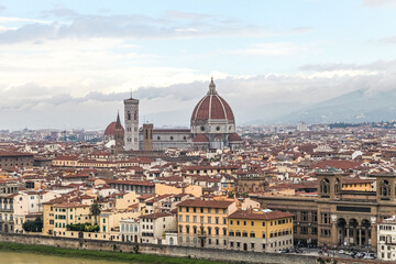 Fototapeta premium A Florence Firenze city in Italy Toscana view with a river running through it