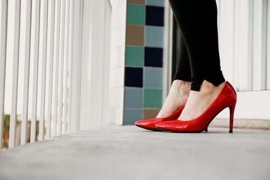 Woman in red high heels