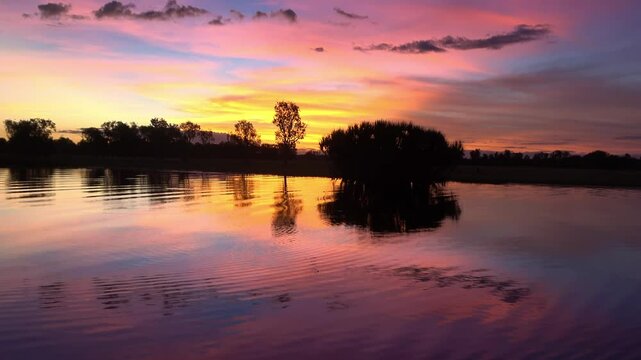 spectacularly and colorful sunset at Yellow Waters Billabong, Kakadu National Park, Northern Territory, Australia