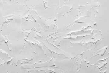 white painted wall, concrete wall texture, abstract background, abstract scratch background of construction worker shovel on white cement wall,
