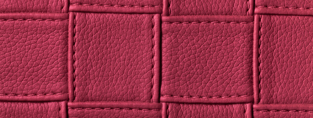 Fototapeta premium Texture of dark red leather background with square pattern and stitch, macro. Abstract wine backdrop