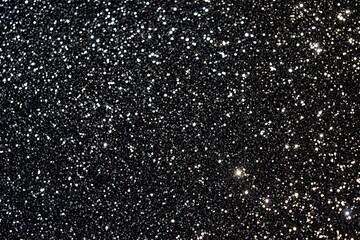 Black Sparkling Glitter Texture Background with Shimmering Light Reflections for Luxury and Glamorous Designs