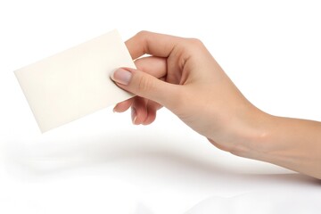 Fototapeta premium Woman's Hand Holding Blank White Business Card Mockup, Isolated on White Background, Closeup, Minimalist Design