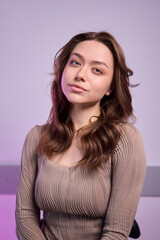Fototapeta premium Stylish Young Woman Captured in a Modern Office Setting, Exuding Charm and Confidence