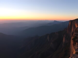 Majestic Mountain Sunset Landscape Scenic View of Mountain Range, Sky, Horizon, and Cliff Edge.