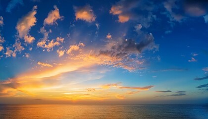 Fototapeta premium beautiful luxury soft gradient orange gold clouds and sunlight on the blue sky perfect for the background take in everning twilight large size high definition landscape photo