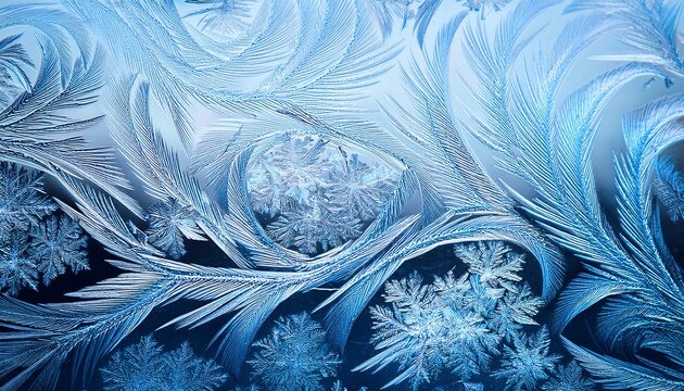 winter frost patterns on glass ice crystals or cold winter background