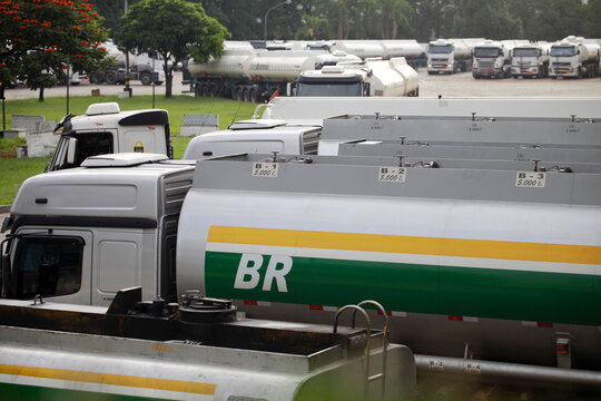 Sao Paulo, SP, Brazil - May 28, 2018: Petrobras tanker trucks queue for refill fuel in a gas storage facility.