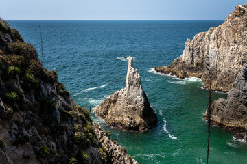 Maruata Beach in the municipality of Aquila, Michoacan, Mexico. el dedo de Dios rock (the finger of God)