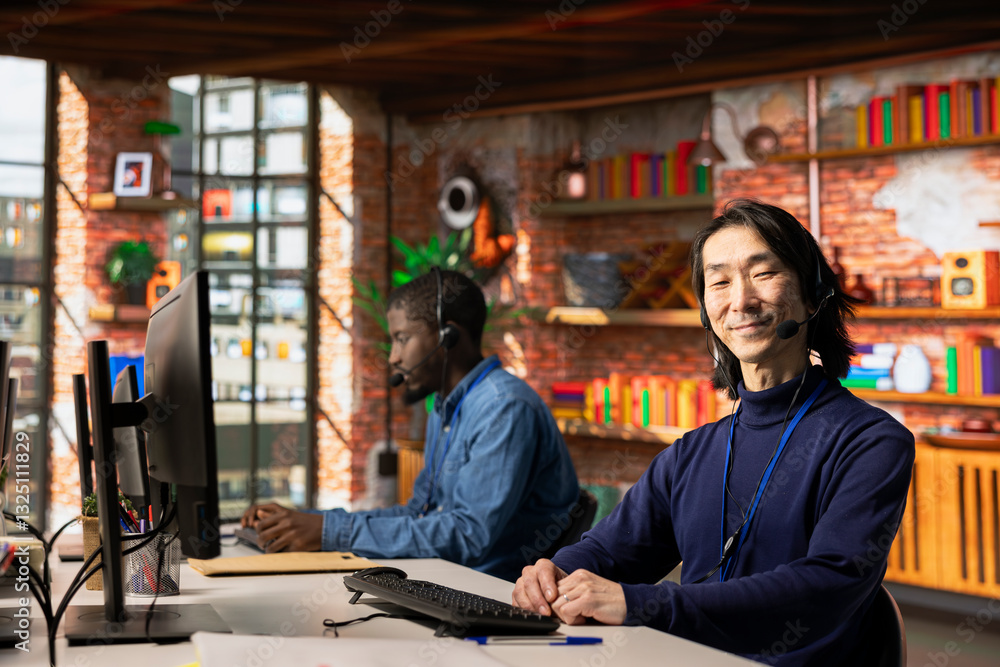 Poster portrait of cheerful call center agent using remote access tools on computer to connect to customer 