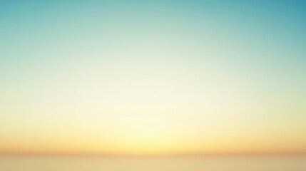 A gradient sky transitioning from blue to yellow and orange hues