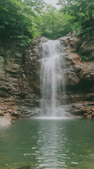 Fototapeta premium Serene Waterfall Landscape Photo