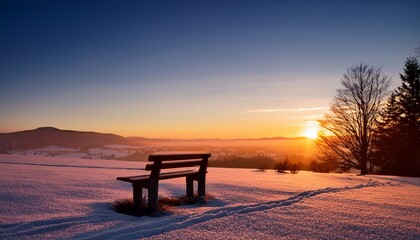 resting bench at sunrise alone in the winter