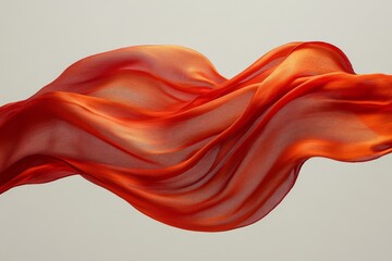 Red silk scarf flowing in breeze against neutral beige background