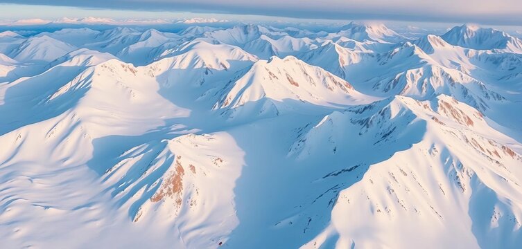 Aerial view of snow-covered Kolyma Mountains, Magadan Region, Siberia Vast winter landscape, Russian Far East,  Russian landscape, arctic