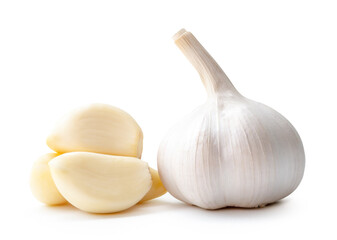 Side view of fresh white garlic bulbs with peeled garlic clove or pieces in stack isolated on white background with clipping path