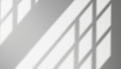 Sunlight streams through a window casting a grid of shadows on a wall