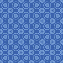 Blue circular floral motifs forming a neat repeat. Seamless pattern perfect for textiles, stationery, wallpapers, and modern decorative surface design.