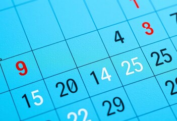 Close-up of a textured blue calendar page showing date numbers and grid , blue tones, office supplies