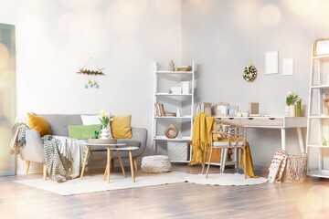 Interior of light living room decorated for Easter celebration
