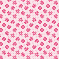 Pink floral seamless pattern with stylized star-shaped blossoms, cute repeating design perfect for kids' fabric, wrapping paper, and cheerful backgrounds.