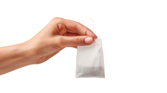 Woman hand holding tea bag on transparent background