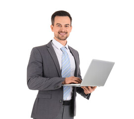 Handsome businessman in suit using laptop on white background