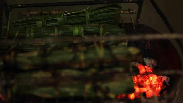 cassava pamonha rolled in banana leaf. Typical Brazilian food known as carim&atilde;