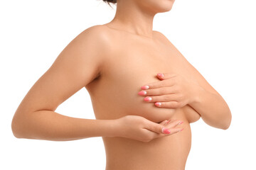 Fototapeta premium Naked young woman covering her breasts on white background, closeup