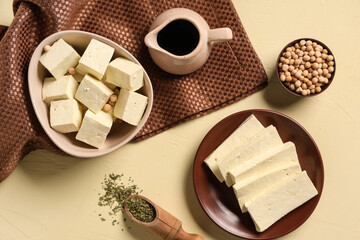 Tasty tofu cheese on beige background
