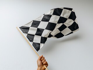 A hand holding a checkered flag against a white background