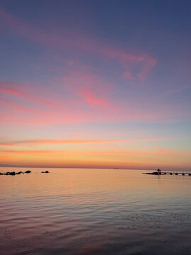 sunset over the sea in finlands archipelago 