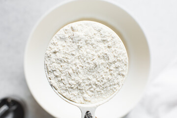 overhead view of All purpose flour, top view of baking flour in a bowl
