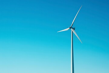 Fototapeta premium White Wind Turbine Against Clear Blue Sky