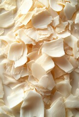 Aesthetic Close-Up of Creamy White Shavings on Neutral Background for Culinary and Creative Use in Food Photography and Natural Product Theme