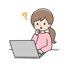 パソコンの前で困った表情をする女性