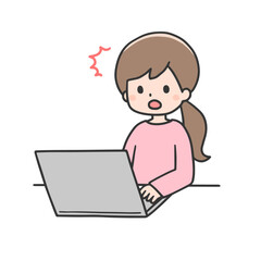 パソコンの前で驚く女性