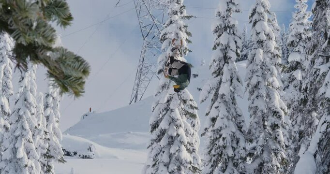 Front Flip Snowboarding Over Powder Jump