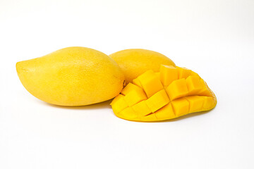 Mango. Tropical Fruits. On a wooden background.