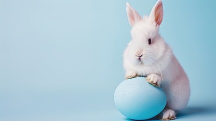Easter Adorableness: A Fluffy Bunny's Blue Egg - Holding Delight