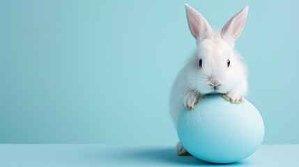 Easter Adorableness: A Fluffy Bunny's Blue Egg - Holding Delight